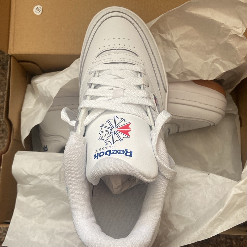 Reebok sneakers.